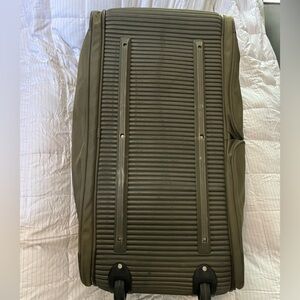 Large Briggs & Riley olive green rolling duffle bag.